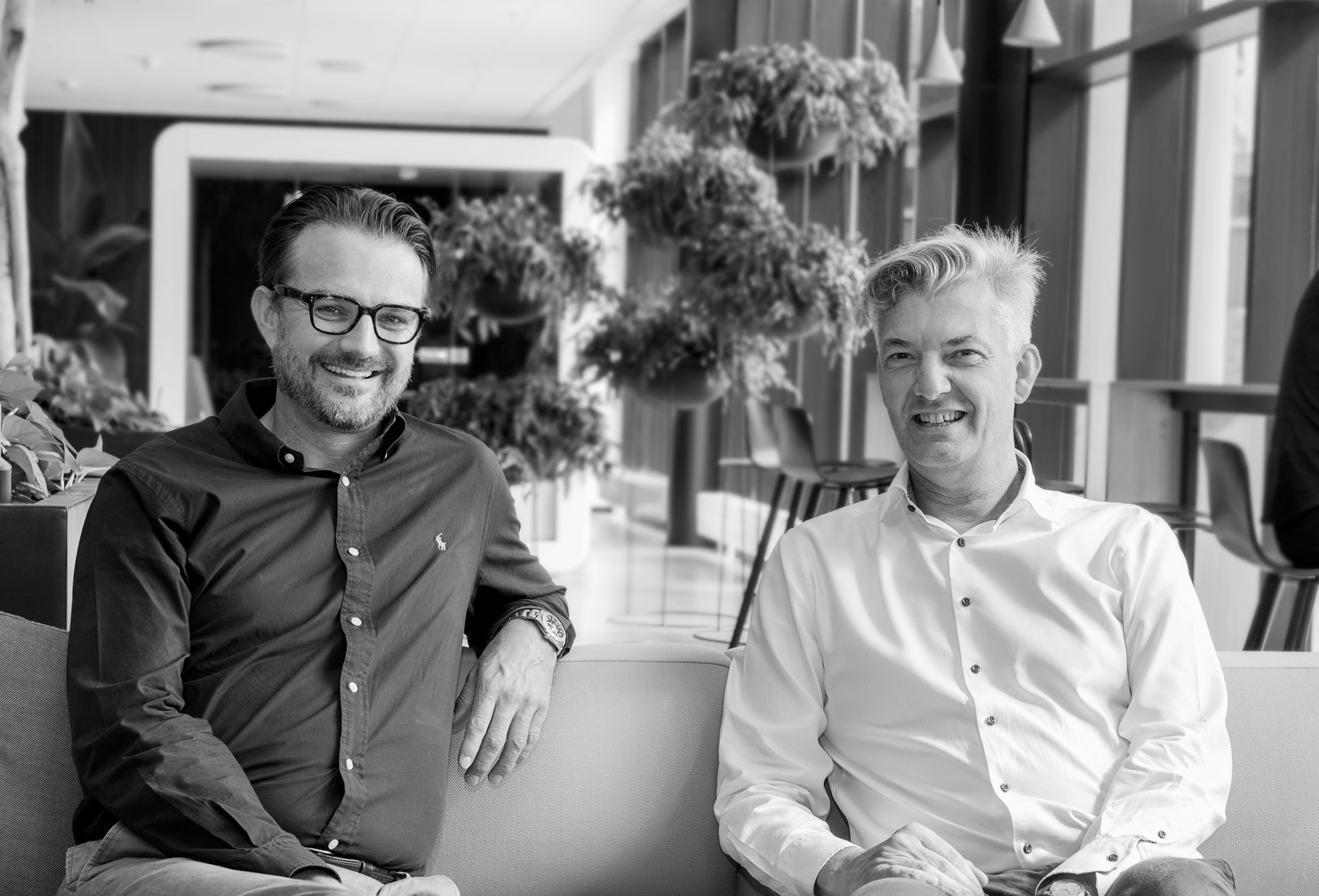 Ulrik Ahrendt-Jensen, adm. direktør i OK-Fonden, og Allan Polack, Group CEO i PFA.